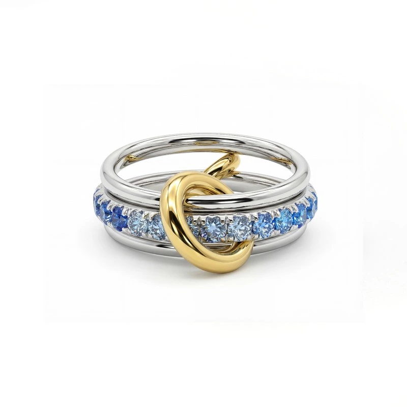 Two-tone Gold Interlocked 3-Band Blue Sapphire Ring In blank background