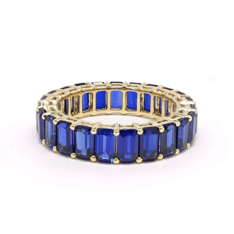 Yellow Gold Shared Prong Emerald Cut Blue Sapphire Full Eternity Band