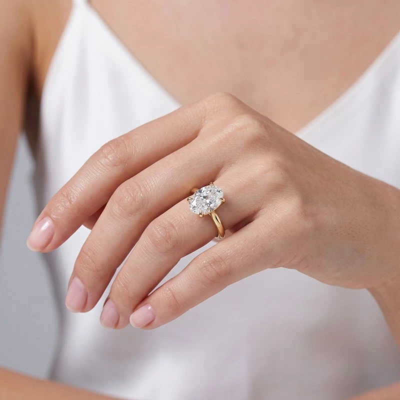 Yellow Gold Oval Lab Diamond Solitaire Engagement Ring Wearing