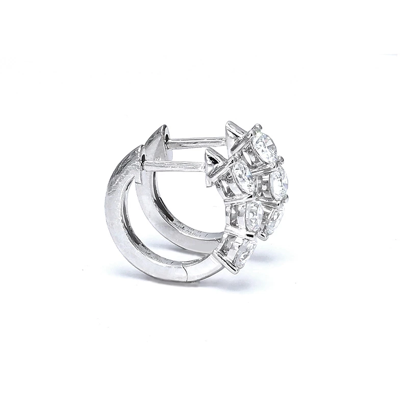 left view of three-stone lab diamond huggies
