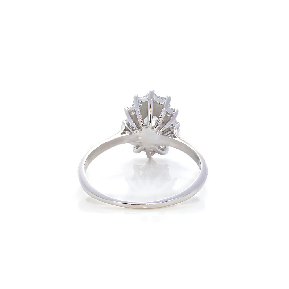 background of Oval Floral Halo Lab Created Diamond Ring